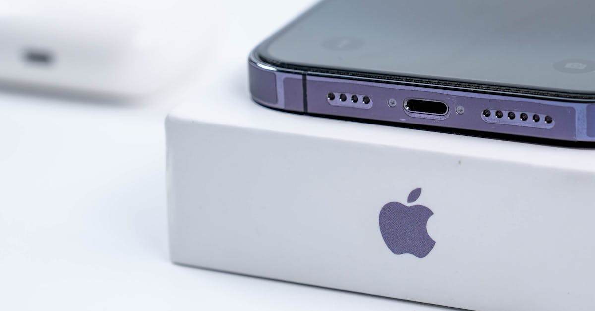 Detailed image of an advanced smartphone on a white branded box, showcasing sleek design.